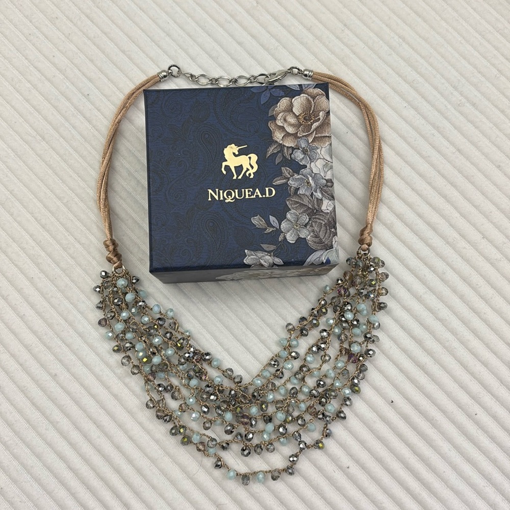 Niquea.D multi strand crystal necklace light turquoise and shimmery beads